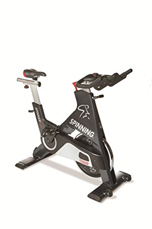 Spinner Blade Commercial Spin Bike Manufactured by Star Trac with Four Spinning DVDs by Mad Dogg