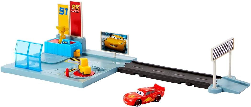 ​Disney and Pixar Cars On The Road Dinoco Rusteze Racing Center Playset with Lightning McQueen Toy Car, Launcher, Short Track and Spinning Pitty, Toy Gift for Kids, HGV69 Multicolor