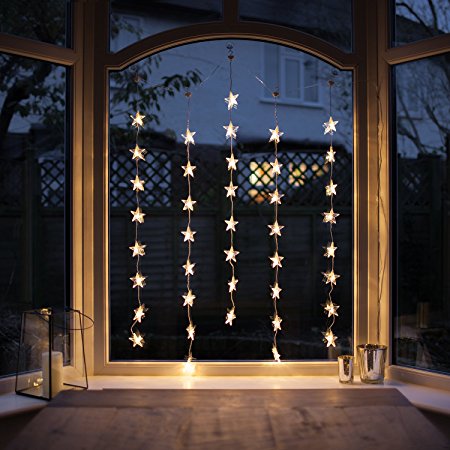 Indoor Star Curtain Light with 40 Warm White LEDs on Clear Cable by Lights4fun