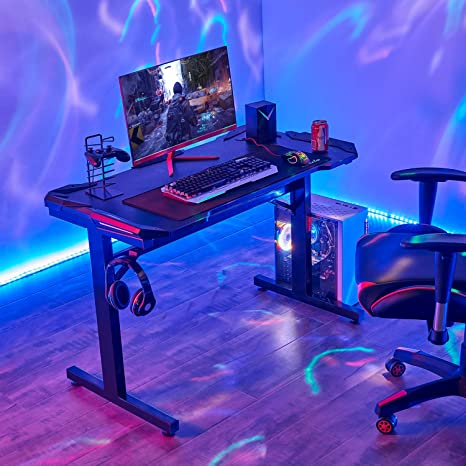 Sedeta Gaming Desk with Large Carbon Fiber Surface, Ergonomic T-Shaped Professional Gamer Table with Headphone Hook, E-Sports Computer Desk, Racing Gamer Home Office Desk (Black)