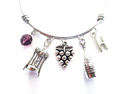 Wine themed personalized bangle bracelet. Antique silver charms and a genuine Swarovski birthstone colored element.