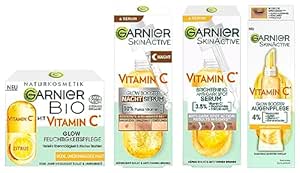 Garnier Vitamin C Set Glow Booster Set für Tag und Nacht aus Brightening Anti-Dark-Spot Serum, Vitamin C Glow Booster Augenpflege Vitamin C Glow Booster Nachtserum und Vitamin C Tagescreme, 4 teilig