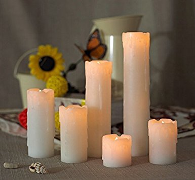 Set of 6 variable sized real wax Flickering Flameless LED Candles, making them ideal for Weddings, Birthdays, Christmas and all celebratory occasions