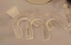 Mouth trays for home teeth whitening system.