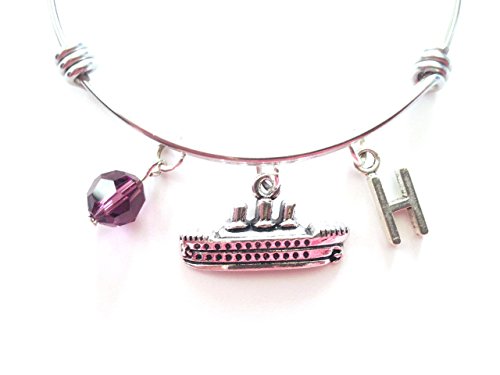 Cruise / Cruising themed personalized bangle bracelet. Antique silver charms and a genuine Swarovski birthstone colored element.