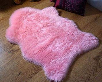 Soft pink faux fur single sheepskin style rug 70 x 100 cm