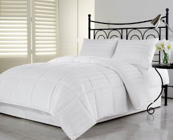 Queen Duvet Premium Down Alternative Comforter by Liliane Collection • Elegant Satin Finish and Hotel Duvet Quality • Medium Warmth for All-Season Comfort • 100% Hypoallergenic Microfiber • Light Duvet Insert with Tabs on All Four Corners • Box Quilting and Piped Edges • Fits Full and Queen Beds • 15-Year Warranty on Duvets and Duvet Inserts