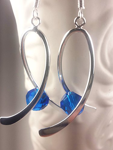 Colon cancer awareness earrings. Silver ribbon earrings with capri blue Swarovski crystals.