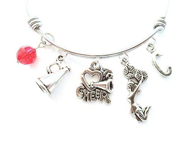 Cheerleading / Cheerleader themed personalized bangle bracelet. Antique silver charms and a genuine Swarovski birthstone colored element.