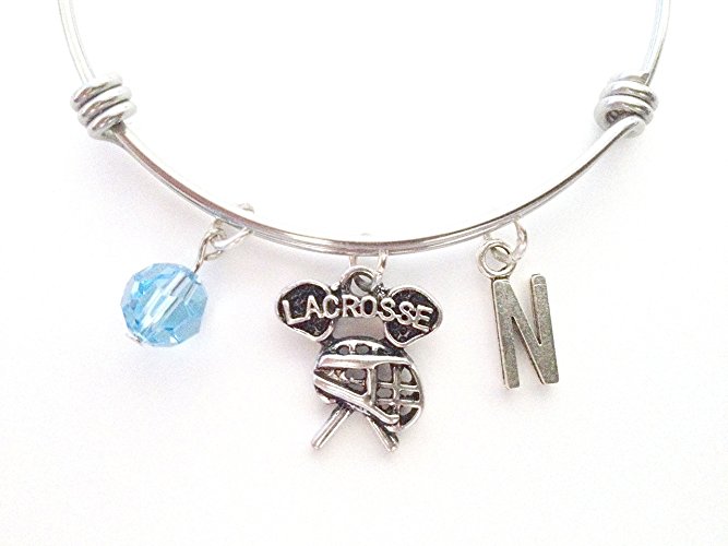 Lacrosse themed personalized bangle bracelet. Antique silver charms and a genuine Swarovski birthstone colored element.