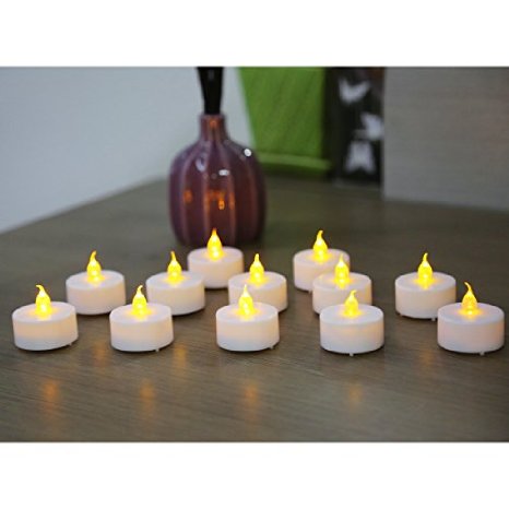 12 piece Set of Flickering Flameless Tea Light Candles. Battery-Operated LED Pillar Candles, suitable for all festive occasions, including Weddings, Birthdays, Christmas parties, and as Centerpieces for your dining table
