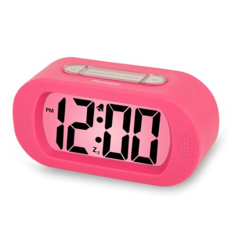 Plumeet Easy Setting Travel Alarm Clock with Silicone Protective CoverDigital Clock Alarm Clock Radio Large DisplayElectric Alarm Clock with Snooze Light Function Batteries Powered Pink