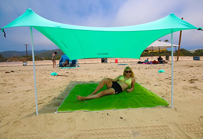 Best XL Portable Beach Shade, Sun Shelter, Canopy Sail Tent, Large Sunshade - Includes Carrying Bag, 2 Poles, 2 Stakes For Park / Grass Use, Elastic Lycra Sail, and 4 sandbags.