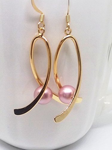 Breast cancer awareness ribbon earrings. Gold plated with pink Swarovski pearls.