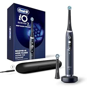 Oral-B iO Deep Clean   Protect Rechargeable Electric Toothbrush, Black with a iO Series 7 Toothbrush, 2 Replacement Brush Heads, and a Charging Travel Case