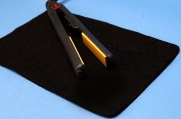 Black Heat Resistant Straightening Iron Mat by Mateque