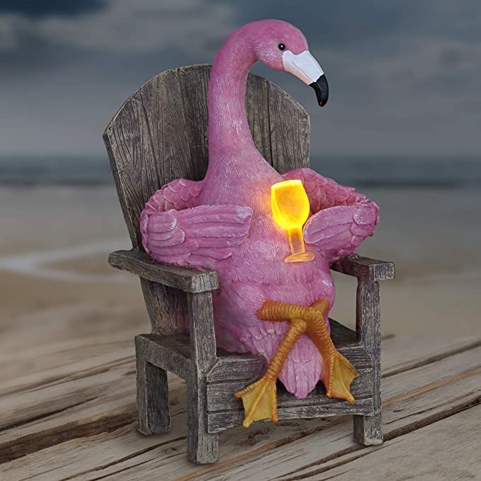 Exhart Pink Flamingo Seated on a Lounge Chair Garden Statue w/Solar LED Cocktail Glass – Flamingo Resin Statue Holding a Cocktail Glass w/Solar-Powered LED Lights – Flamingo Decor, 8” x 12” Inches