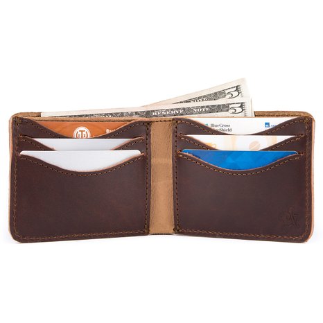 Saddleback Leather Medium Bi-Fold Wallet: Slim, Indestructible, Multi-Card Holder Design with RFID Protection.