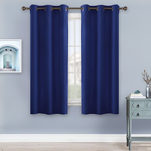 Bedroom Blackout Drapery and Curtain Panels - NICETOWN All Season Thermal Insulated Solid Grommet Top Blackout Drapes for Kid's Room (1 Pair, 42 x 63 Inch In Navy Blue)
