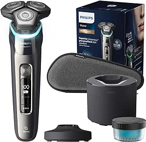 Philips Serie 9000 Afeitadora Eléctrica Hombre, Maquina de Afeitar Barba con Barbero, Lift&Cut, Tecnologia SkinIQ, Inalambrica, Recargable, Centro Limpieza, Base Carga, Funda, S9974/55, Cromo