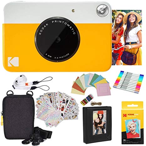 Kodak Printomatic Instant Camera (Yellow) Gift Bundle   Zink Paper (20 Sheets)   Deluxe Case   7 Fun Sticker Sets   Twin Tip Markers   Photo Album   Hanging Frames   Comfortable Neck Strap
