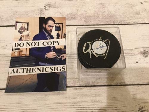 Braden Holtby Signed Puck - PROOF d - Autographed NHL Pucks