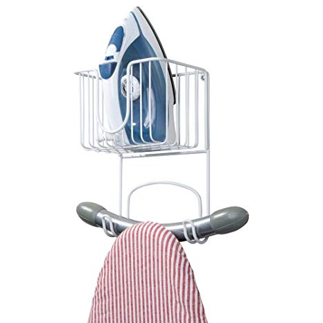 mDesign Wall Mount Metal Ironing Board Holder with Small Storage Basket - Holds Iron, Board, Spray Bottles, Starch, Fabric Refresher for Laundry Rooms - White