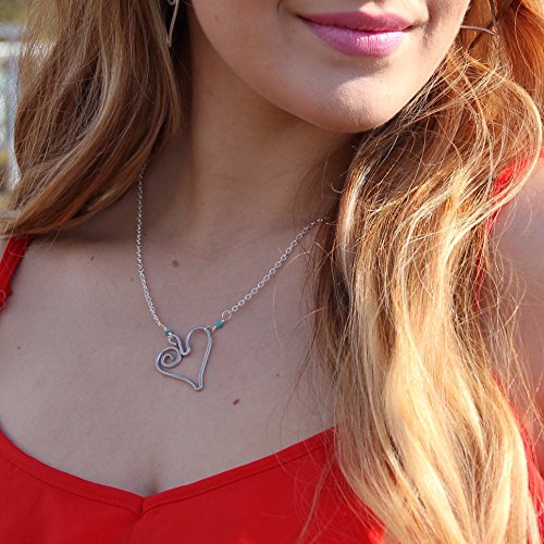 Inspiring Jewelry: Follow Your Heart Necklace that empowers mothers in need by Madres Jewelry.