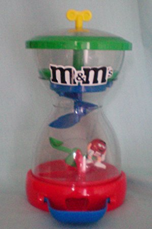 M&M M & M Candy Dispenser -- M&Ms Drop Onto SeeSaw To Raise Character -- as shown