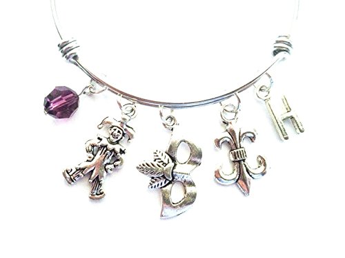 Mardi Gras themed personalized bangle bracelet. Antique silver charms and a genuine Swarovski birthstone colored element.