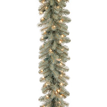 National Tree 9 Foot by 12 Inch "Feel Real" Downswept Douglas Blue Garland with 70 Clear Lights (PEDDB1-312-9A-1)