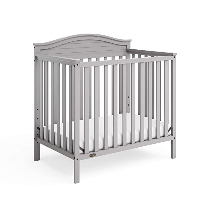 Graco Stella 4-in-1 Convertible Mini Crib with Bonus Mattress – Includes Bonus 2.75 Inch Thick Mattress with Water-Resistant Cover, Converts to Twin Bed with Headboard and Footboard, Pebble Gray