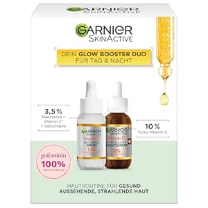 Garnier Vitamin C Glow Booster Serum Duo für Tag & Nacht, Mit Anti-Dark Spot Serum und Brightening Night Serum gegen dunkle Flecken und müde Haut, Vegane Formel, SkinActive, 2 x 30 ml