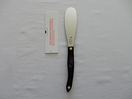 CUTCO Model 1768 Spatula Spreader. . . . . 4.9" Double-D serrated edge blade..............5.1" Highly engineered thermo-resin handle in Classic Brown (sometimes called Black).