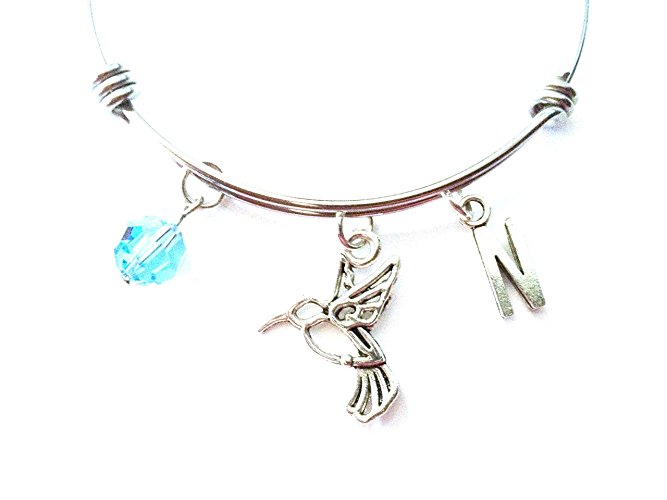 Hummingbird themed personalized bangle bracelet. Antique silver charms and a genuine Swarovski birthstone colored element.