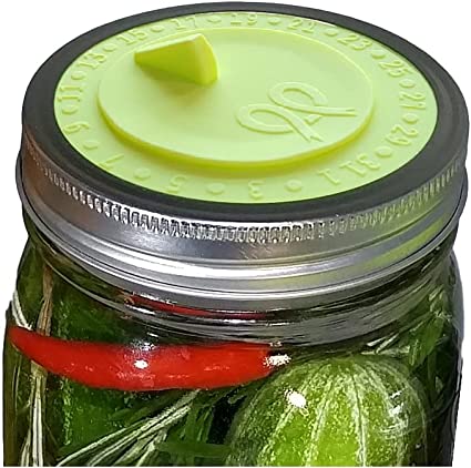 7pack Maintenance free airlock waterless fermentation lids for wide mouth mason jars. Make Sauerkraut, Kimchi, Pickles, any fermented vegetable probiotic foods. BPA free, mold free, dishwasher safe.