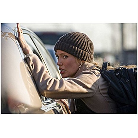 Salt (2010) 8 Inch x 10 Inch Photograph Angelina Jolie Wearing Olive Green Knit Hat & Backpack Leaning Against Car kn